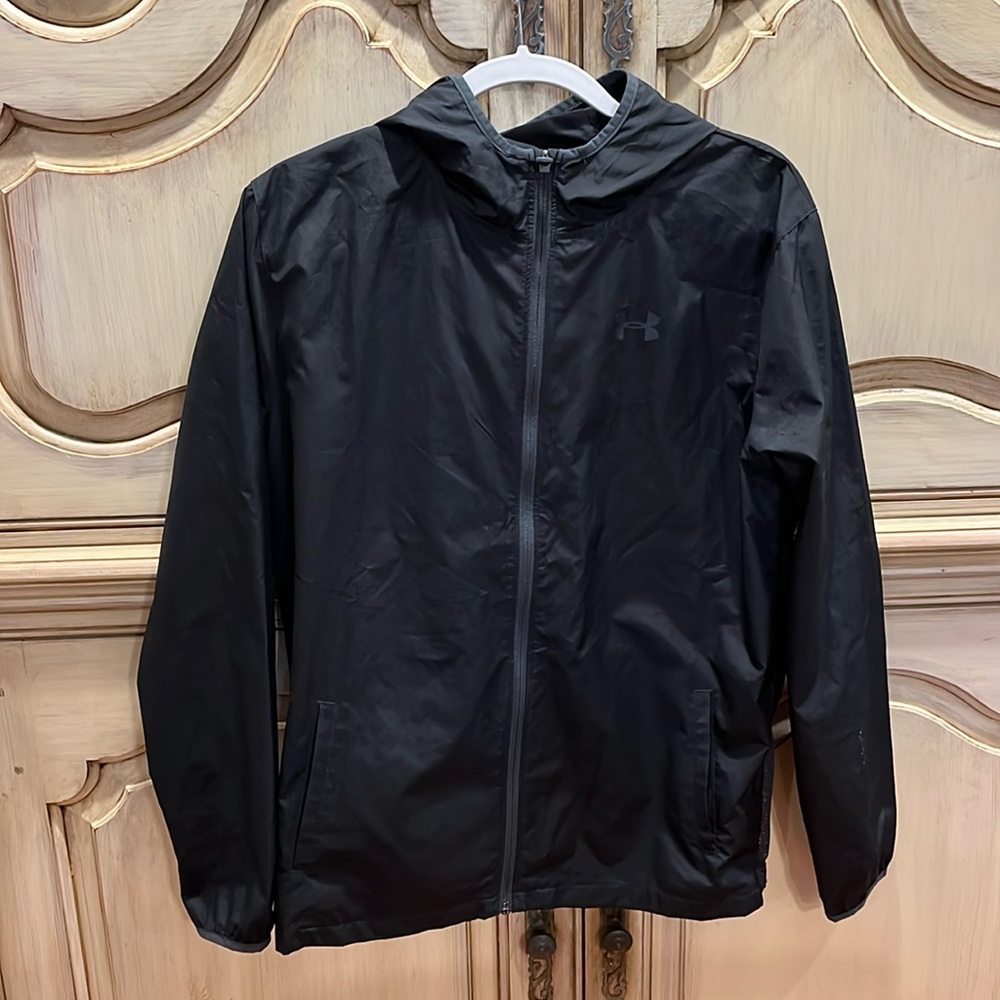 Under Armour Youth XL windbreaker that CONVERTS INTO A BACKPACK!  So cool!
